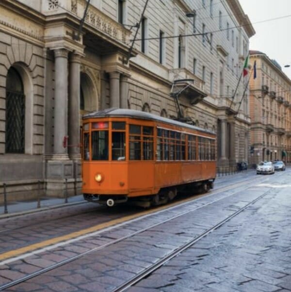 Trolley car and track along side of street