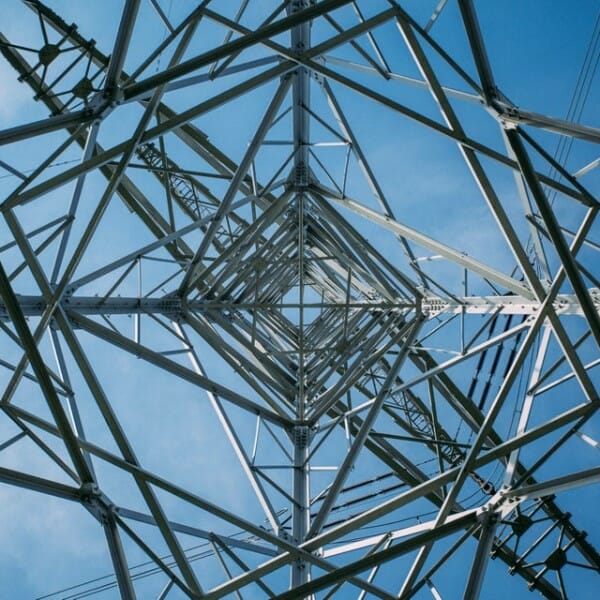 Looking up thorugh a electrical pylon